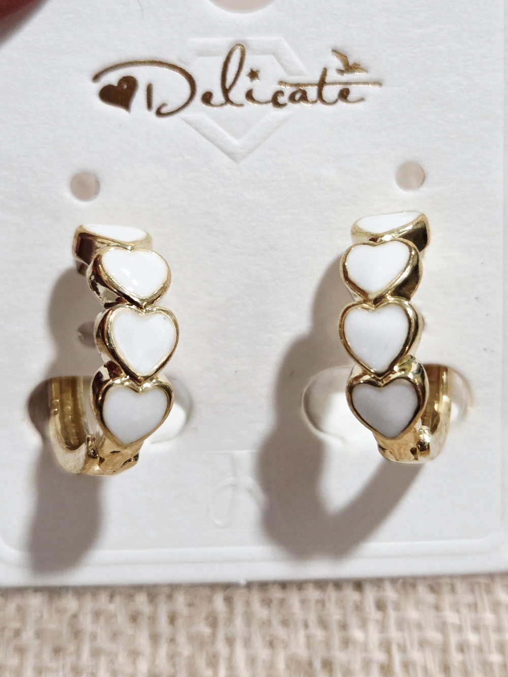 delicates Gold Hoop Earrings with White Heart Accents